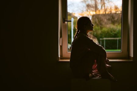 Young bored millennial woman looking at window alo 2023 11 27 05 07 01 utc